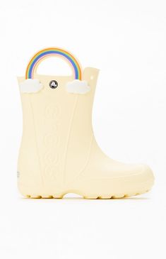 The Crocs Kids Handle It Rainbow Boots bring classic Crocs comfort to rainy days. With a waterproof build to keep feet cozy and dry, oversized handles for easy wear, and a fixed rainbow embellishment with squishy EVA clouds, these boots are perfect for fun and function in any weather.Fixed rainbow embellishment and squishy EVA cloudsWaterproof rain bootLarge handles for easy on and offReflective heel logosIncredibly lightweightIconic Crocs Comfort™ Crocs Kids Handle It Rainbow Boots - Ivory size 3 Kids White Waterproof Rain Boots For Spring, Casual White Rain Boots For Outdoor, White Waterproof Rain Boots For Winter, White Rain Boots For Winter Outdoor Use, White Winter Rain Boots For Outdoor, Cream Waterproof Round Toe Boots, Cream Waterproof Boots With Round Toe, Casual White Rain Boots For Winter, White Weatherproof Rain Boots For Outdoor