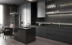 a modern kitchen with black cabinets and marble counter tops