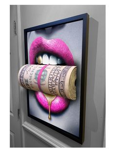 a rolled up roll of money sitting on top of a wall next to a pink lipstick