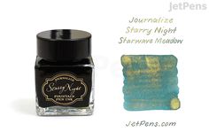 a bottle of fountain pen ink next to a stamp pad with the words journey night written on it