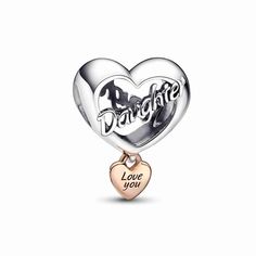 Show your appreciation for the dearest people in your life with the Love You Daughter Heart Charm. Crafted from sterling silver, this heart-shaped design features the word “Daughter” in openwork script on both sides. A small heart-shaped dangle in 14k rose gold plating adds a heartfelt touch, with the words “Love you” engraved on both sides. A meaningful gift for beloved daughter, to remind her of your love every time she wears her jewelry. Charms Disney, Pandora Essence, Pandora Rose, Charms Pandora, Bracelet Tennis, Bracelet Pandora, Pandora Bracelet Charms, Pandora Silver, Pandora Bracelets