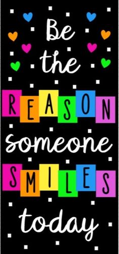 be the reason someone smiles today on black background with colorful blocks and hearts around it