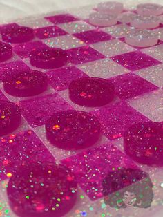 purple and white checkerboard with lots of glitter on the top, as well as circles