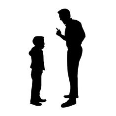 a man standing next to a little boy