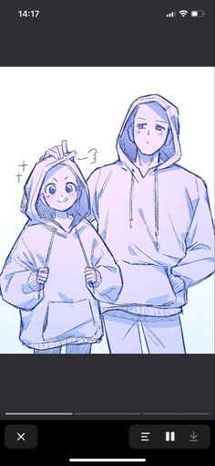 two people standing next to each other wearing hoodies