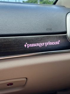 the passenger princess sticker is on the front door of a car's dashboard