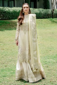 Brand: SAAD SHAIKHProduct Code: IVORY BREEZECollection: Saad Shaikh Fleurie Luxury CollectionFabric: Organza DESIGN DETAILS: Embroidred Shirt with Hand Embellished on OrganzaRaw Silk Trouser with Embroidered Bell BottomZari Net Dupatta with Four Side Embroidered Border DISCLAIMER:* Lining, Laces, and Tassels are not included in unstitched variants.* Embellishment items in stitched outfits are subject to market availability.* Product color may vary due to photographic lighting or your device sett Branded Wedding, Organza Suit, Maxi Frocks, Simple Maxi, Organza Suits, Luxury Pret, Eid Outfit, Embroidered Organza, Embroidered Border