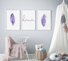 two purple feathers are hanging on the wall next to a white chair and stuffed animal