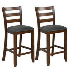 two wooden barstools with grey upholstered seat cushions