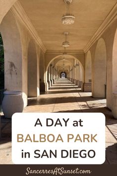 a long hallway with the words a day at balboa park in san diego