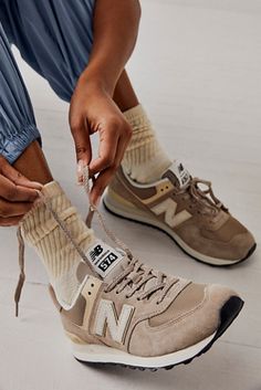 574 Sneakers | Free People New Balance Shoes Fashion, Retro Tennis Shoes Outfit, Fall Shoes Comfy, Womens 574 New Balance Outfits, Chic Sneakers Women, Free People Fall Aesthetic, Fall Comfy Shoes, Mom Tennis Shoes, Fall 2024 Sneaker Trends Women