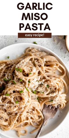 garlic miso pasta in a white bowl with text overlay