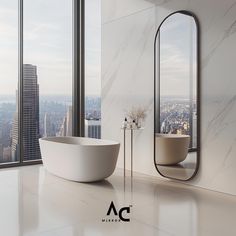 a bath tub sitting next to a tall window