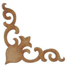 an ornate wooden cutout with swirls and leaves on the bottom, in brown