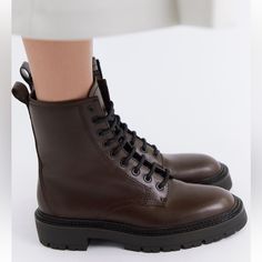 Zara Lace-Up Flat Leather Ankle Boots. Color Chocolate Brown Size 37 Flat Ankle Boots In Leather. Lug Soles. Back Pull Tab. Lace-Up Closure. Sole Height: 1.6 Inches (4 Cm) Chocolate Brown Upper 100% Cow Leather Lining 84% Polyester 16% Polyurethane Sole 100% Rubber Insole 100% Goat Leather Tongue 100% Polyurethane Fall Boots Brown Boots Winter Boots Combat Boots Brown Boots Lace Up Boots Zara Boots Fashion Boots Calf Leather Combat Boots With Round Toe For Work, Calf Leather Ankle Combat Boots For Work, Workwear Ankle Combat Boots In Calf Leather, Workwear Calf Leather Ankle Combat Boots, Workwear Calf Leather Combat Ankle Boots, Elegant High Ankle Leather Combat Boots, Calf Leather Combat Boots, Zara Brown Ankle Boots, Elegant Leather Combat Boots For Work