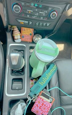 the interior of a car with various items in the dash board and steering wheel controls