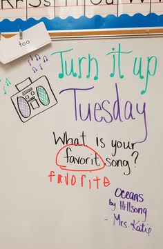 a white board with writing on it that says turn it up tuesday and what is your favorite song?