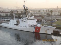 a large boat is docked in the water