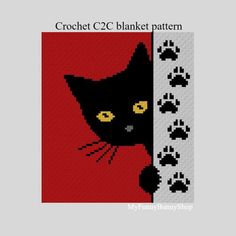 a cross stitch pattern with a black cat peeking out from behind a red wall and paw prints