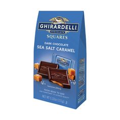 chocolate bar with sea salt caramel on the front and side, in a blue box