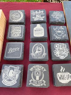 there are many different coasters on the table