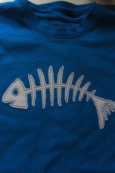 a t - shirt with a fish skeleton on it