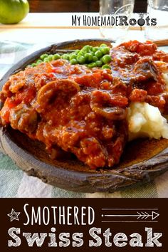 some meat and vegetables on a plate with the words, smothered swiss steak