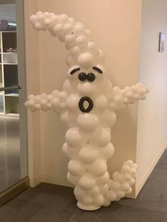 an inflatable balloon character is standing on the floor