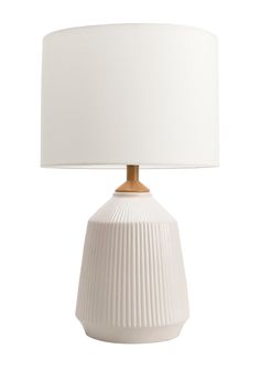 a white lamp with a wooden base and a white lampshade on the side