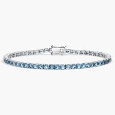 With a full circle of aquamarine gemstones, this tennis bracelet brings colorful style to every look. Wear this 14k gold aquamarine tennis bracelet solo or as part of a larger stack. Tenis Bracelet, Aquamarine Birthstone, Pearl Bracelet Gold, Aquamarine Bracelet, Platinum Rose Gold, Gold Rings Fashion, Gold Pearl Necklace, Ladies Diamond Rings, Gold Pearl Earrings