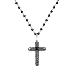 The "Profound Belief - Silver Matte Onyx Cross Charm Necklace" symbolizes the inner strength we receive from our faith as we enter new phases of our lives. Matte Onyx stones will encourage compassion for yourself and others and enhance your innate healing abilities. The sacred Cross knows how to put your soul in the needed flow for gaining the traits you've always wanted: altruism, long-lasting faith, and increased empathy. This way, you build more meaningful relationships and start to respect quality over quantity in every aspect of your life. 925 Oxidized Sterling Silver  4 mm Matte Onyx Stone  Care Guidelines Avoid contact with water, chemicals and perfumes as these may cause tarnishing and discoloration. Clean gently with a dry, non-abrasive cloth. Black Engraved Cross Pendant Necklace, Black Symbolic Cross Pendant Necklace, Black Crucifix Necklace Engraved, Black Engraved Crucifix Necklace, Black Engraved Pendant Cross Necklace, Black Symbolic Cross Pendant Jewelry, Symbolic Black Cross Pendant Jewelry, Black Spiritual Cross Pendant Necklace, Spiritual Black Cross Pendant Necklace