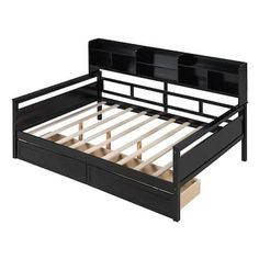 a black bed frame with two drawers on each side and an open drawer underneath it