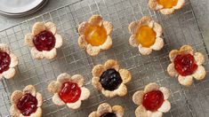 small pastries with jelly fillings on a cooling rack