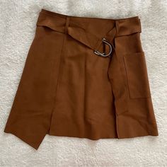 J.O.A. Faux Suede Skirt From Nordstrom. Nwot. Size Small In Camel. Will Fit Size 4-6. Forms With Loop Belt. Asymmetrical Hemline. Brown Suede. Fall Mini Skirt Bottoms With Belt Loops, Fall Mini Skirt With Belt Loops, Fall Mini Skort With Belt Loops, Fall Workwear Skirt With Belt Loops, Casual Belted Mini Skirt For Fall, Fall Denim Skirt With Belt Loops, Casual Belted Skirt For Fall, Casual Mini Skirt With Belt For Fall, Casual Fall Skirt With Belt