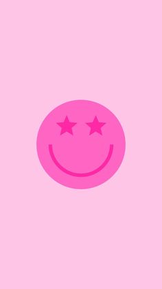 a pink smiley face with three stars on it