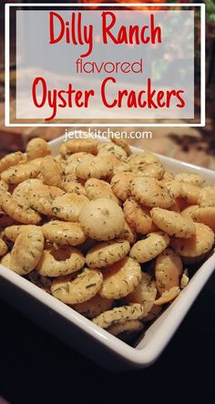 a white bowl filled with cooked oyster crackers