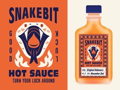 a bottle of snakebit hot sauce next to an orange and white poster with the words,