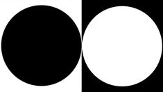 two black and white circles are in the middle of a square