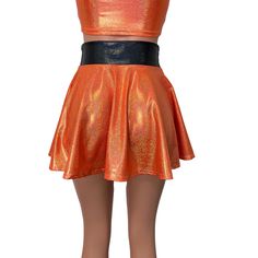 Stretch holographic sparkle orange spandex high-waisted skater skirt with black holographic sparkle waistband. The shimmery fabric shows a rainbow of colors in the light and swings and twirls with movement. The skirt length is 15.5" from top to bottom - but if you'd like it shorter, please say so in the comments. Perfect for your Halloween costume (think Pumpkin!) Orange Sparkle, Black Holographic, Shimmery Fabric, Black Sparkle, A Rainbow, Skirt Length, Skater Skirt, Halloween Costume, Halloween Costumes