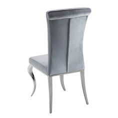 a silver chair with an upholstered seat and back rest on a white background