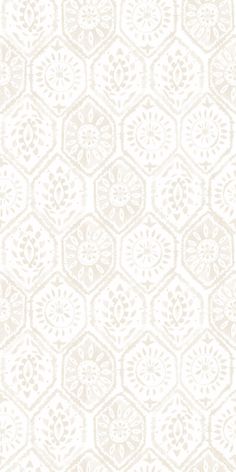 a white and beige wallpaper pattern with hexagonal shapes