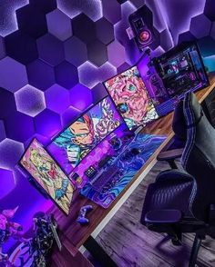 the room is decorated in purple and black with lots of pictures on the wall, along with gaming equipment