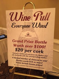 a sign advertising wine for everyone to win