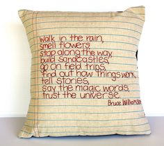 a pillow that has some writing on it