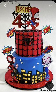 a spiderman themed birthday cake with the number four on it's top tier