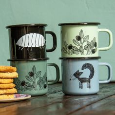 Our enamel mugs can do anything. They are ideal for morning coffee, for picking berries, as a cup for children and for a cozy cup of tea on the sofa. They are also a loyal companion on your next outdoor adventure. The set includes four cups: Franzi Fuchs with flower in dusty blue / "Assel-Tassel" in black / Blueberries in mint / Blueberries in fir green The classic enamel mugs are made for us in Europe with a large proportion of traditional handwork. Each product is unique. Minimal unevenness in the glaze and small deviations at the transition to the rim are due to the production of these high-quality mugs. - made in Europe - high-quality, scratch-resistant print - dishwasher safe - Mug, ⌀8 cm, H8cm, approx. 325 ml Picking Berries, Natural Motifs, Enamel Cup, Berry Picking, Enamel Mugs, Camping Mug, Cup Set, Cupping Set, Outdoor Adventure