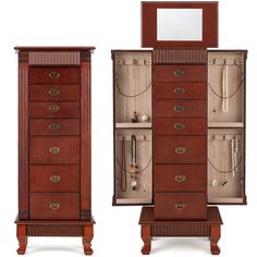 a wooden jewelry cabinet with drawers and mirror