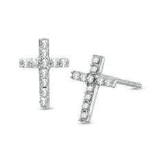 Dainty and darling, these diamond cross earrings are a thoughtful communion or confirmation gift for her. Fashioned in 10K white gold, each tiny traditional cross-shaped earring is outlined with shimmering diamond accents that catch the eye. Polished to a brilliant shine, these post earrings secure comfortably with friction backs. Diamond Cross Earrings, Cross Stud Earrings, Cross Earrings Studs, Hammered Hoop Earrings, Dangle Hoop Earrings, Gold Filled Hoops, Confirmation Gifts, Diamond Cross, Cross Earrings