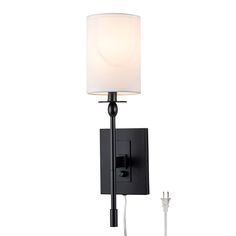 a black wall light with a white shade on the lamp and cord attached to it