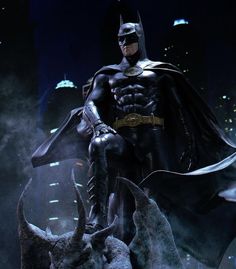 the batman statue is on display in front of a cityscape